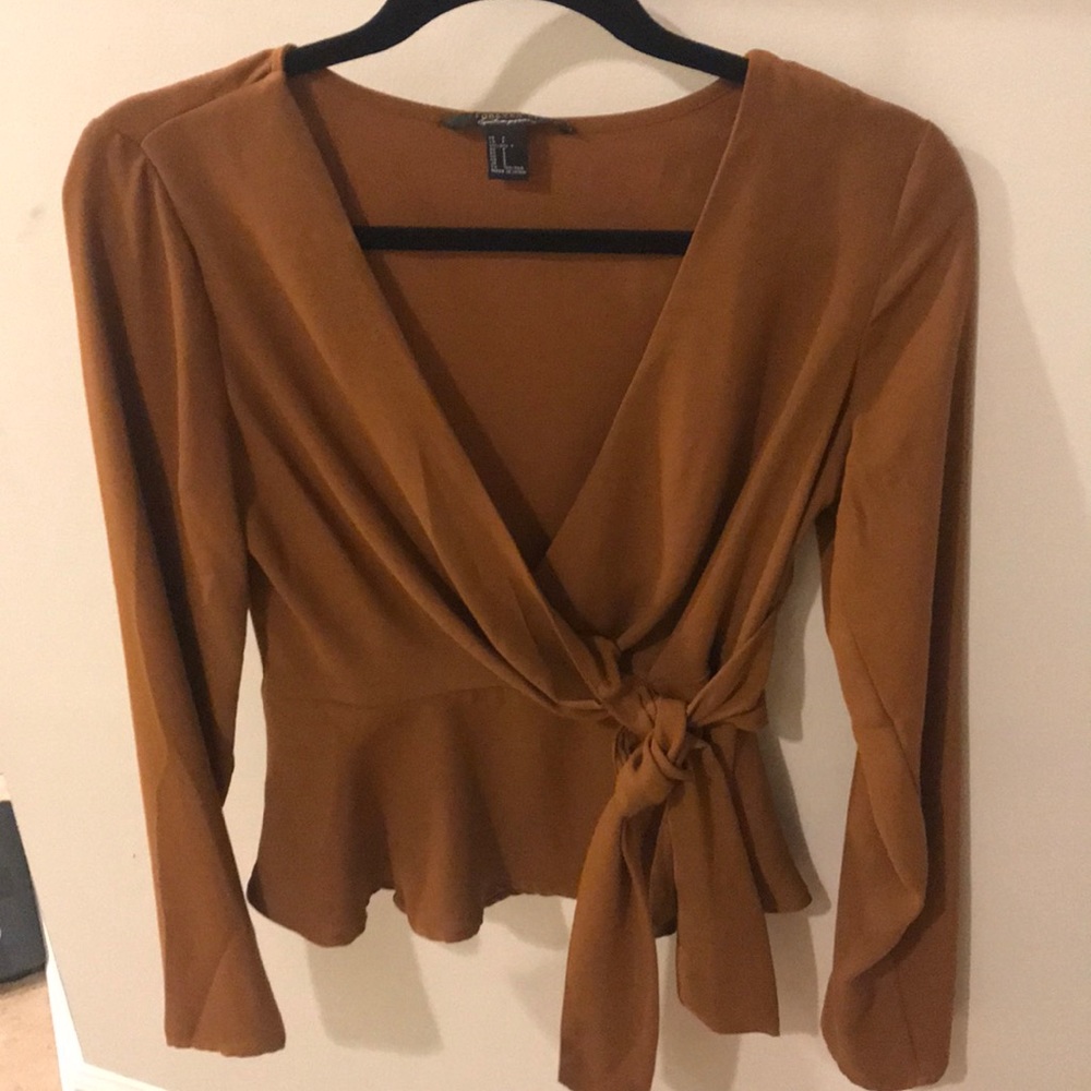 Side tie blouse from F21. Worn once, small stain.